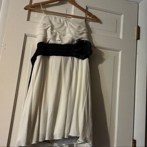 Elegant White Strapless Dress with Black Accents